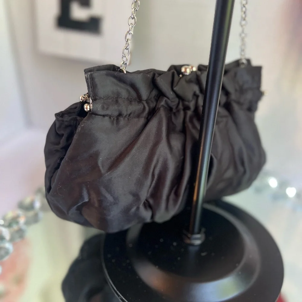 White House black market Chic Black Satin Clutch with Rosette Accent